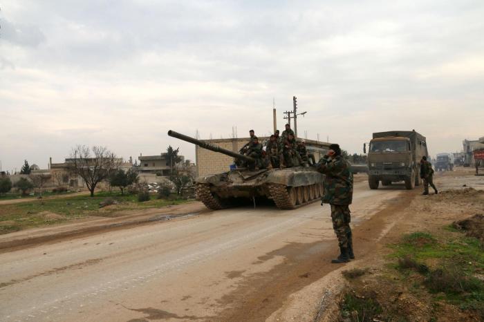 Syrian government forces besiege Idlib’s strategic Saraqeb